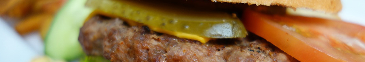 Eating American (Traditional) Burger at Jack Brown's Beer & Burger Joint Roanoke restaurant in Roanoke, VA.